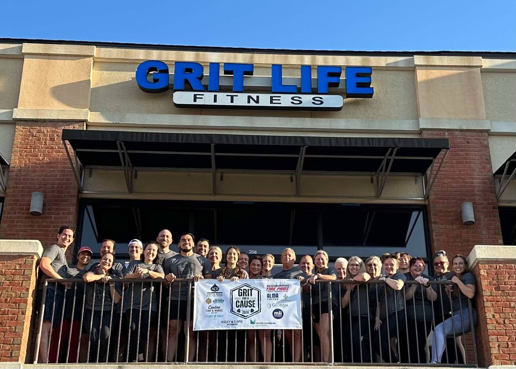 Grit for a Cause participants gathered outside Grit Life Fitness in Canton, Georgia